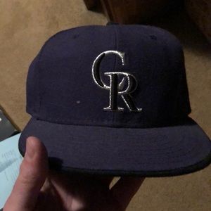 Colorado Rockies on field new era hat